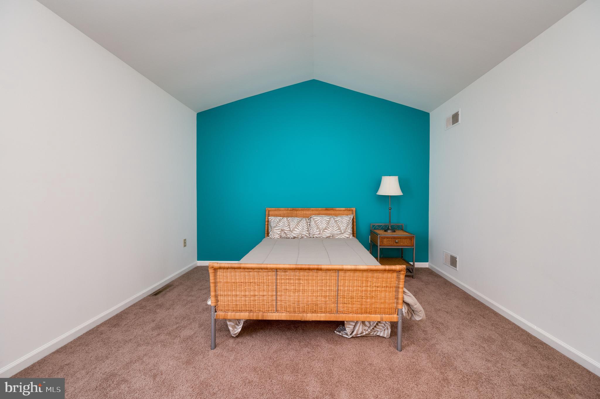 21-4 Cranberry Ridge, Unit 4 Reading, PA 19606 - Photo 30 of 41 a room with a bed and a table