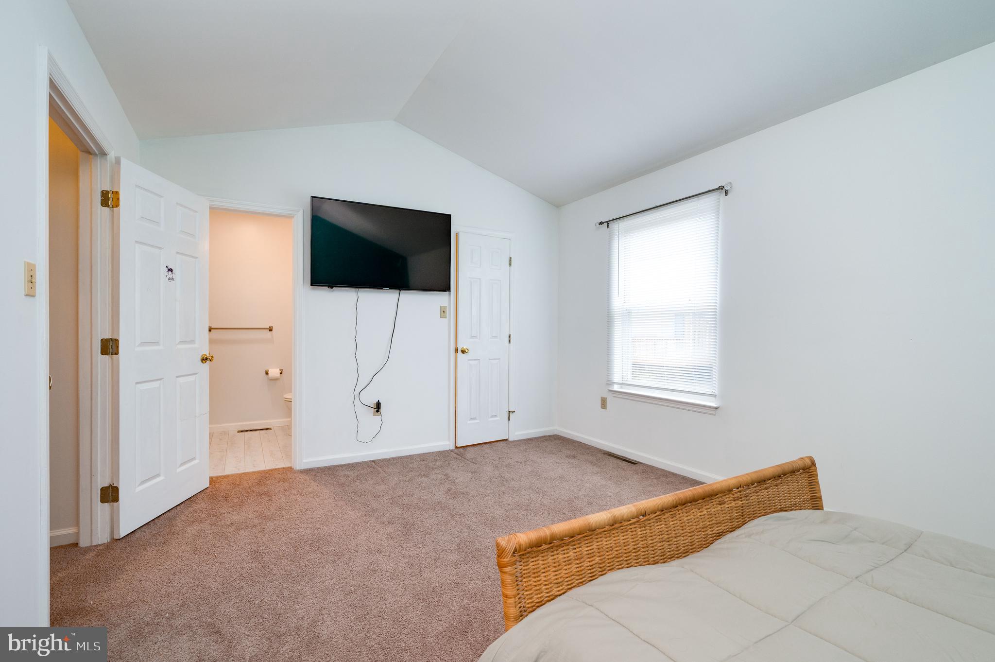 21-4 Cranberry Ridge, Unit 4 Reading, PA 19606 - Photo 31 of 41 a bedroom with a bed and a flat screen tv