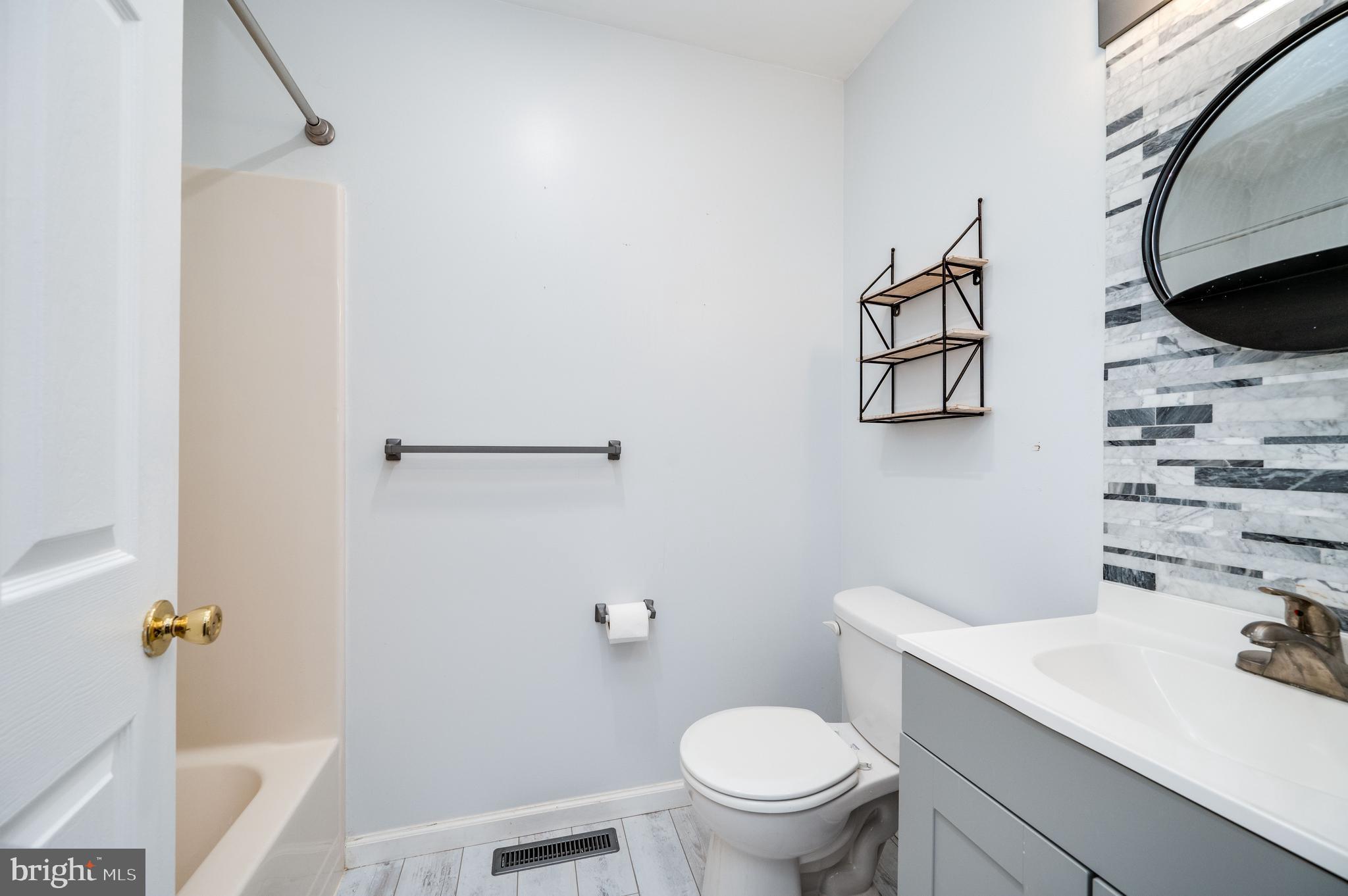 21-4 Cranberry Ridge, Unit 4 Reading, PA 19606 - Photo 32 of 41 a bathroom with a sink toilet and shower