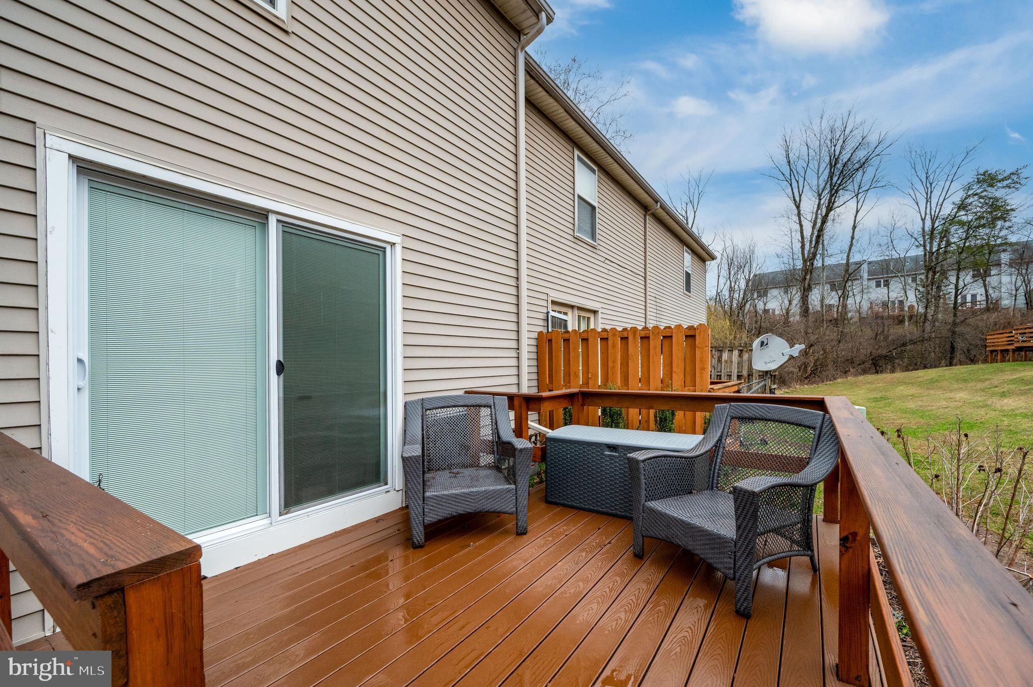 21-4 Cranberry Ridge, Unit 4 Reading, PA 19606 - Photo 38 of 41 a view of a deck with chairs and a barbeque
