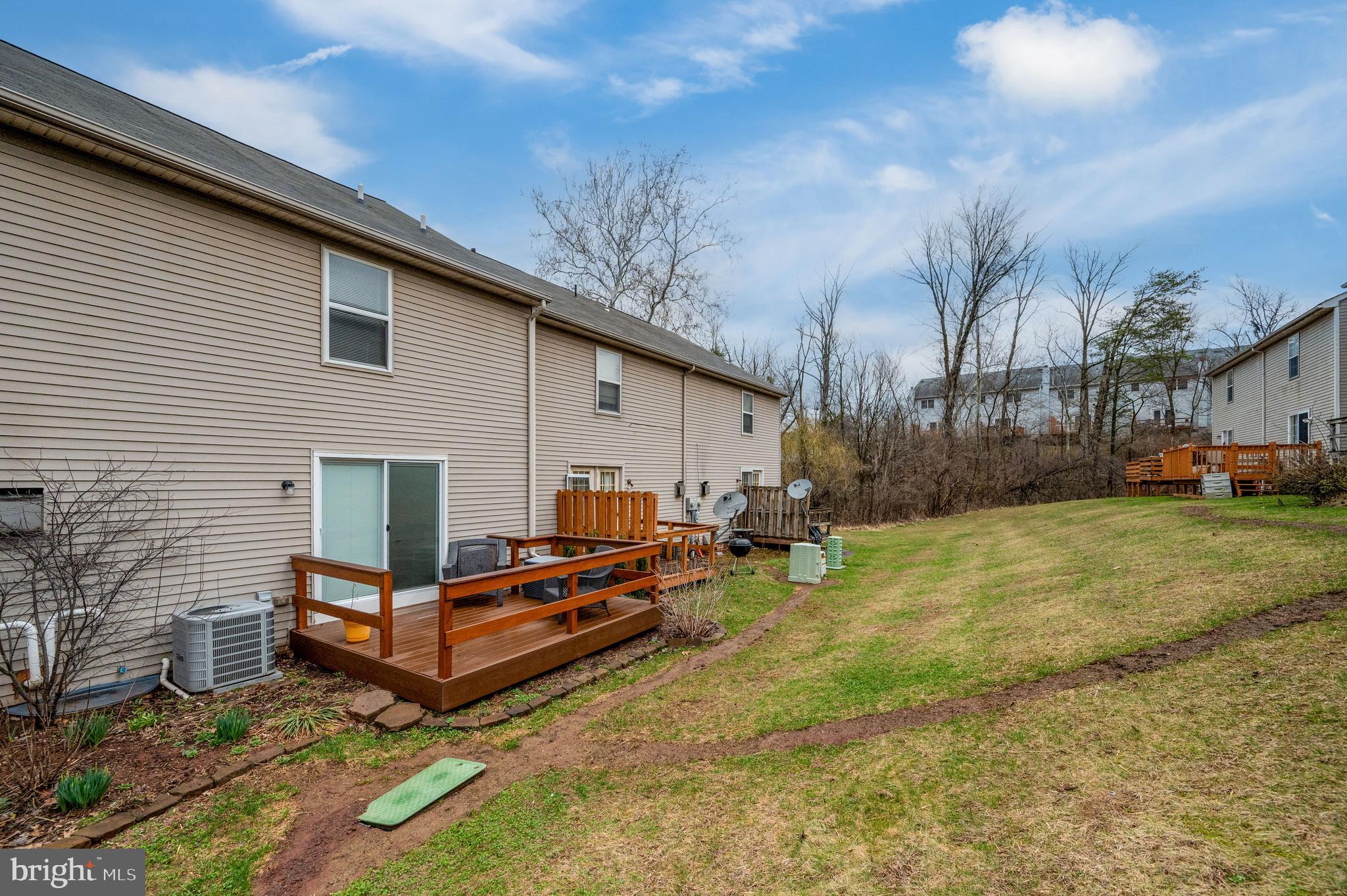21-4 Cranberry Ridge, Unit 4 Reading, PA 19606 - Photo 40 of 41 a view of a house with backyard and sitting area