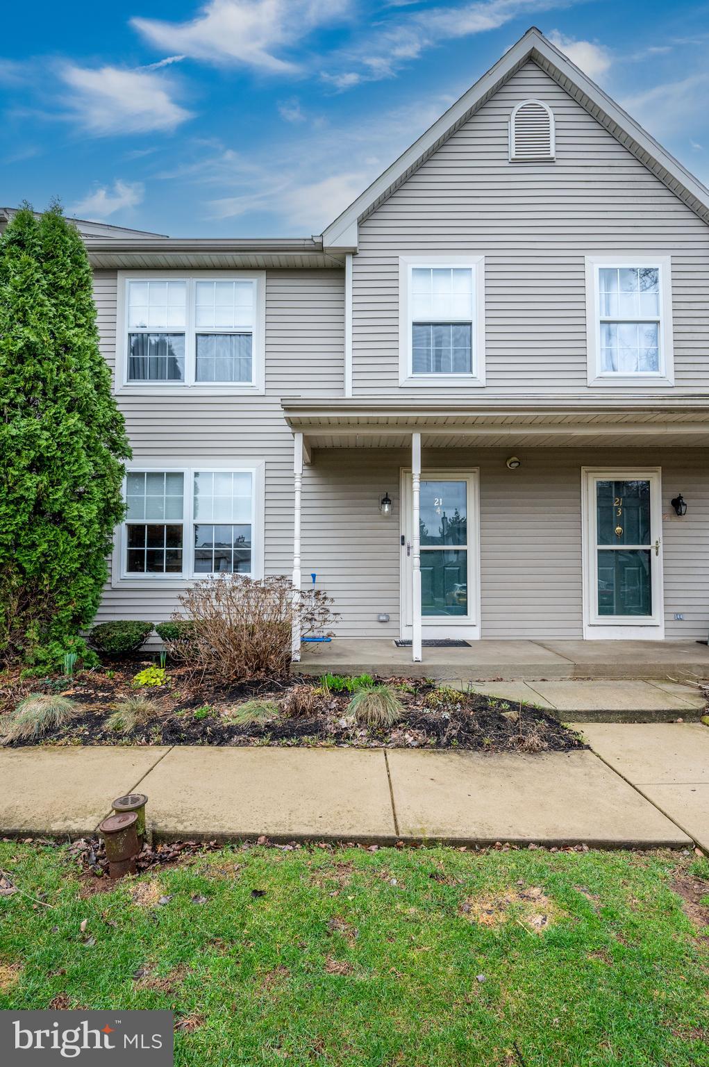21-4 Cranberry Ridge, Unit 4 Reading, PA 19606 - Photo 4 of 41 a front view of a house with a yard