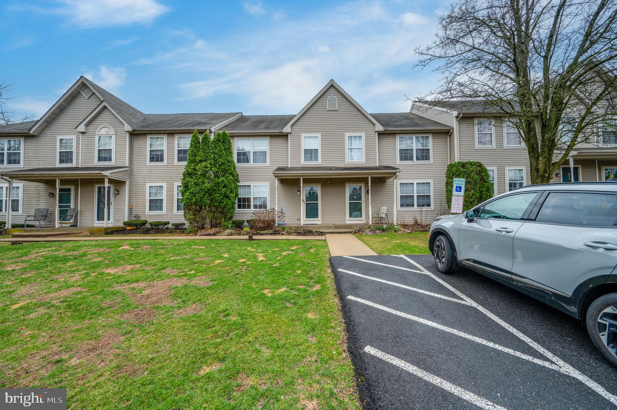 21-4 Cranberry Ridge, Unit 4 Reading, PA 19606 - Photo 41 of 41 a front view of a house with a yard table and chairs