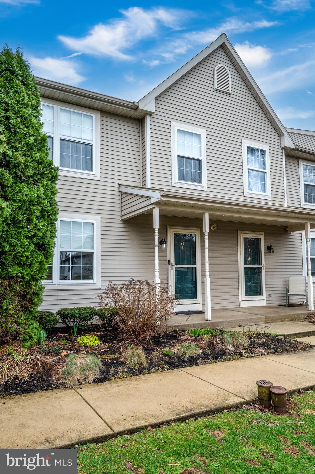 21-4 Cranberry Ridge, Unit 4 Reading, PA 19606 - Photo 5 of 41 a front view of a house with a yard