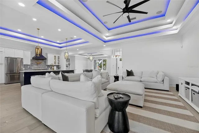 a bathroom with a sink a toilet a mirror and shower