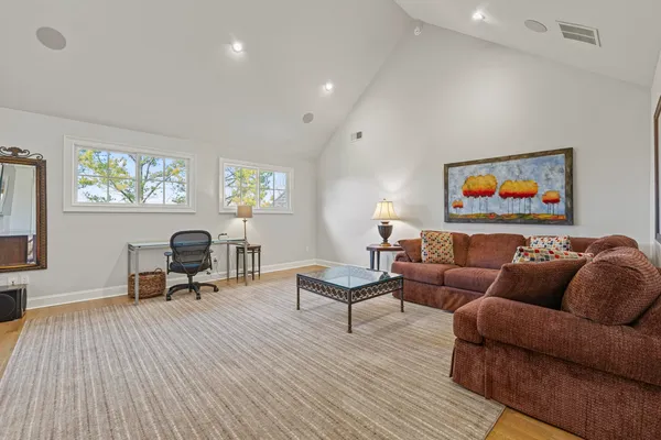a living room with furniture and a couch