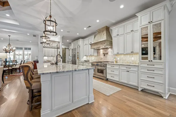 a kitchen with counter top space cabinets and stainless steel appliances