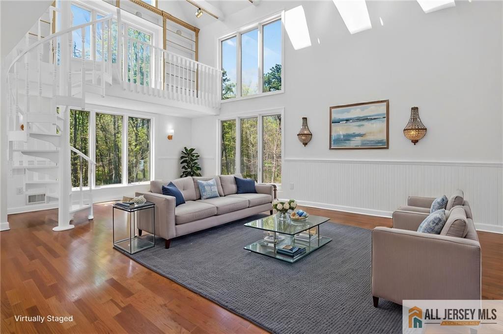 381 Monmouth Road Freehold, NJ 07728 - Photo 62 of 63 a living room with furniture and a large window