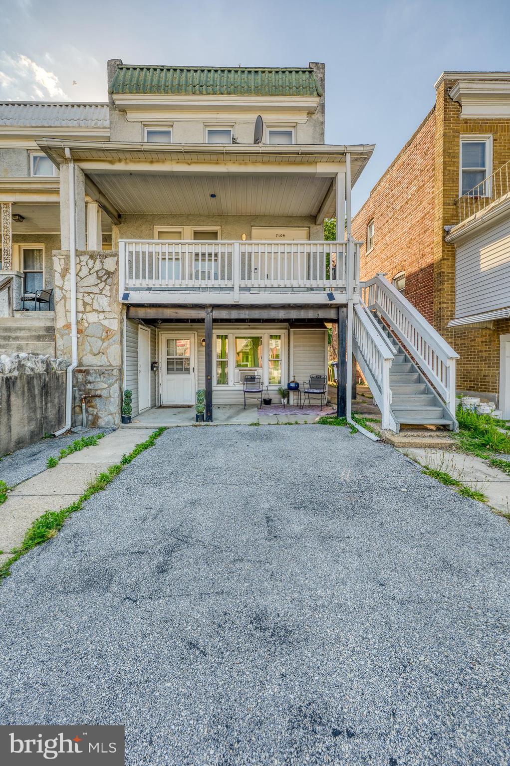 7104 Harford Road Baltimore, MD 21234 - Photo 2 of 37 a view of a building with a outdoor space