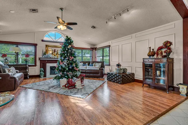 a bed room with a bed and a television