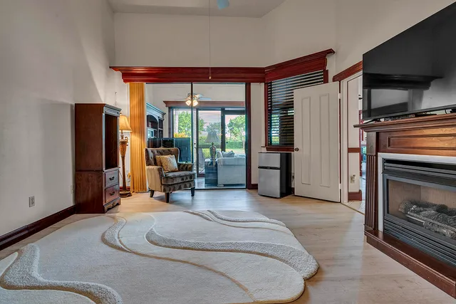 a front view of a house with a yard porch and outdoor seating