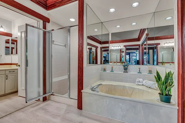 a view of a lake with houses in the back