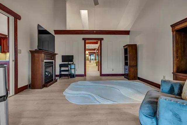 a view of a lake with houses in the back