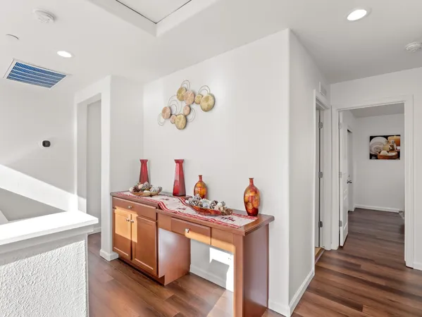 a bathroom with a bathtub shower and a sink
