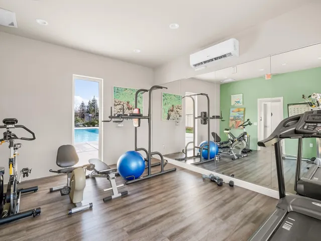 a view of a room with gym equipment