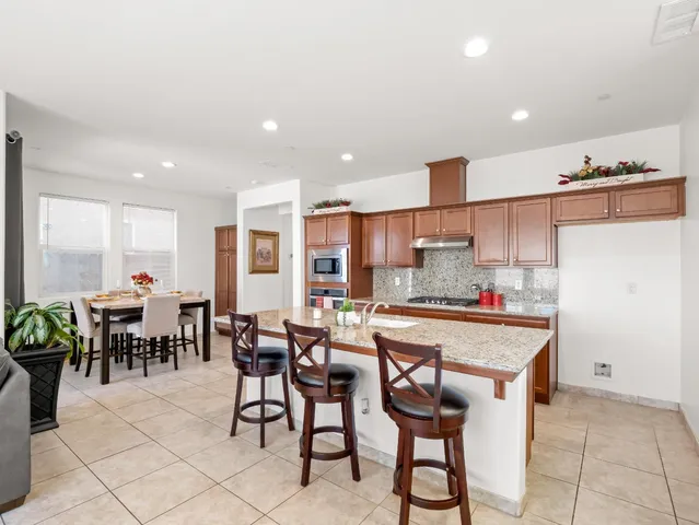 a kitchen with cabinets and counter space