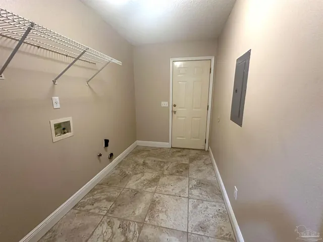 a view of room with window and hardwood floor