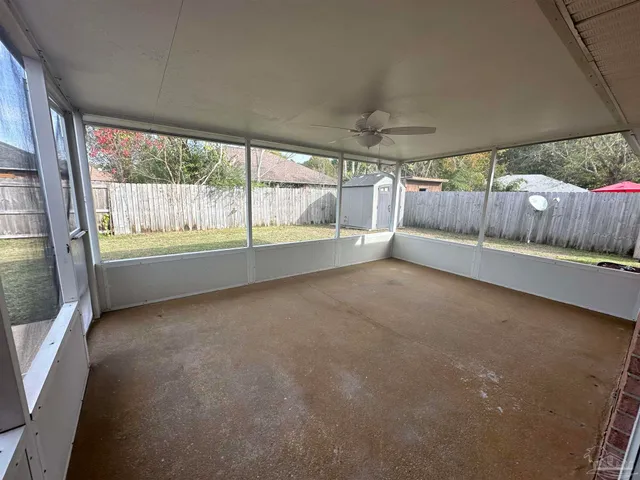 a view of an empty room with a sliding door