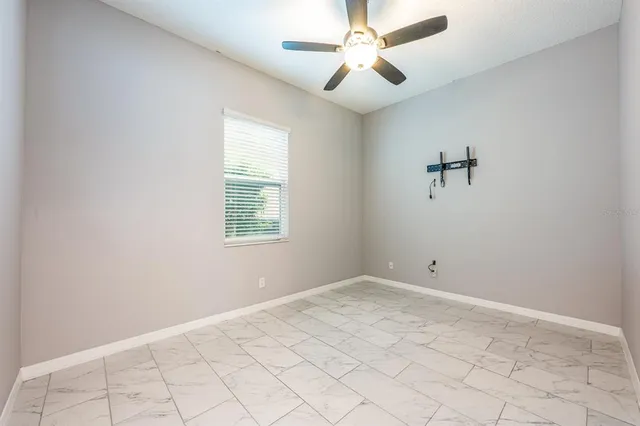 an empty room with windows