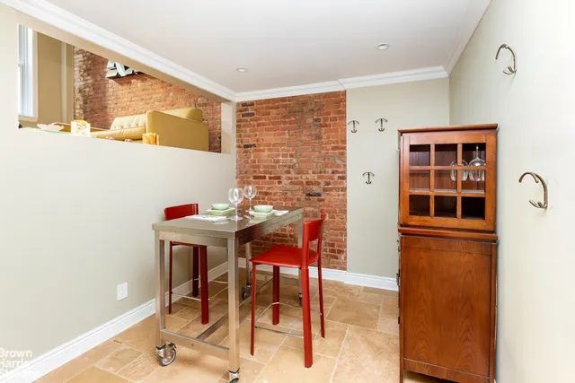 a workspace with furniture and window