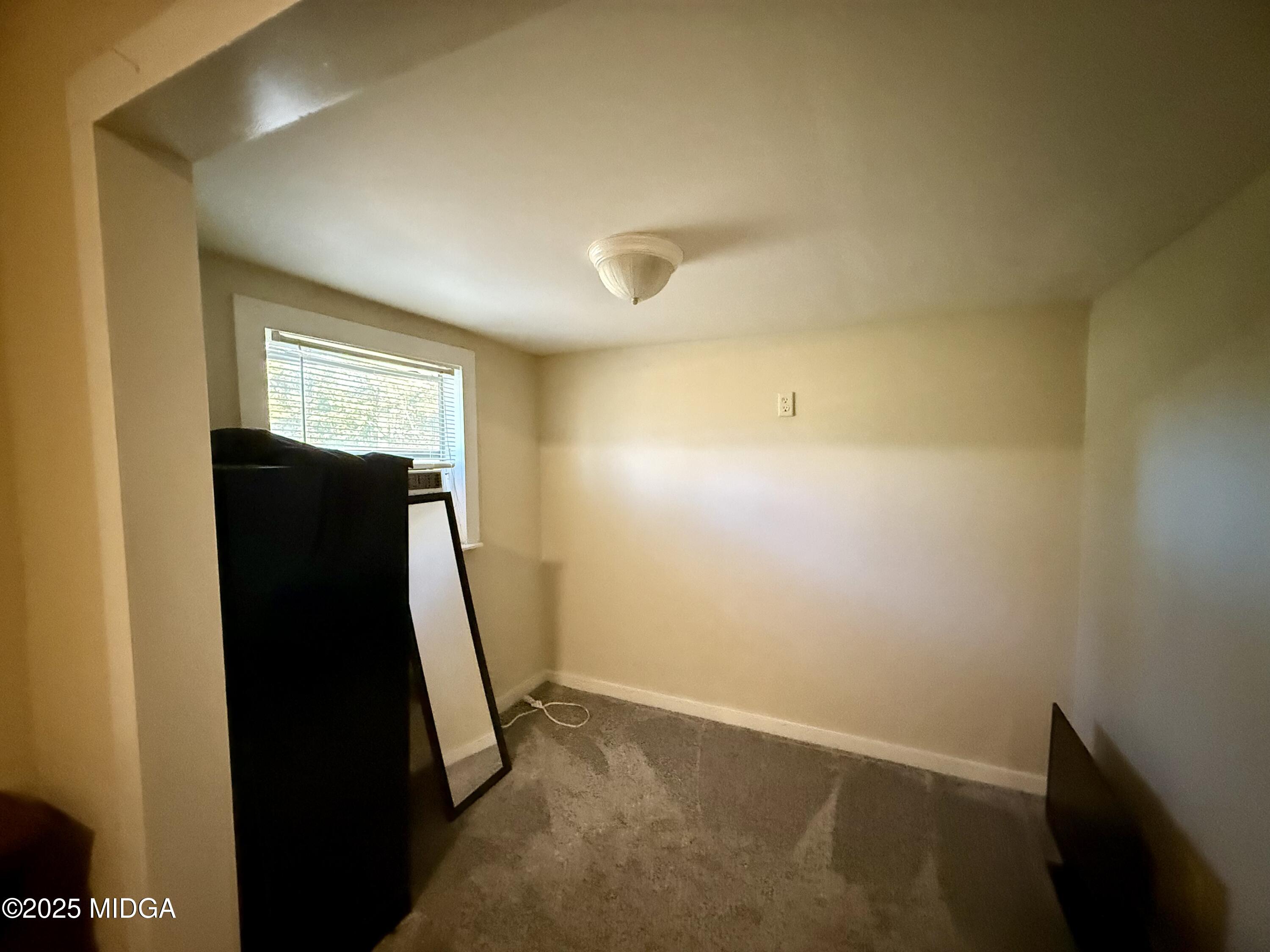 89 Springdale Road Jackson, GA 30233 - Photo 13 of 13 a view of a closet in a room