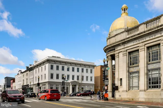 a front view of a building with street view