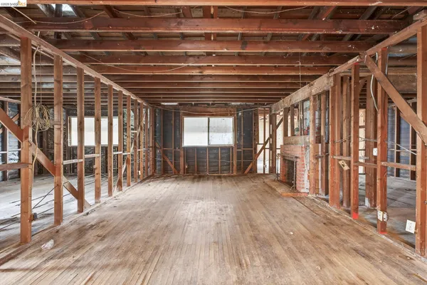 a big room with wooden floors