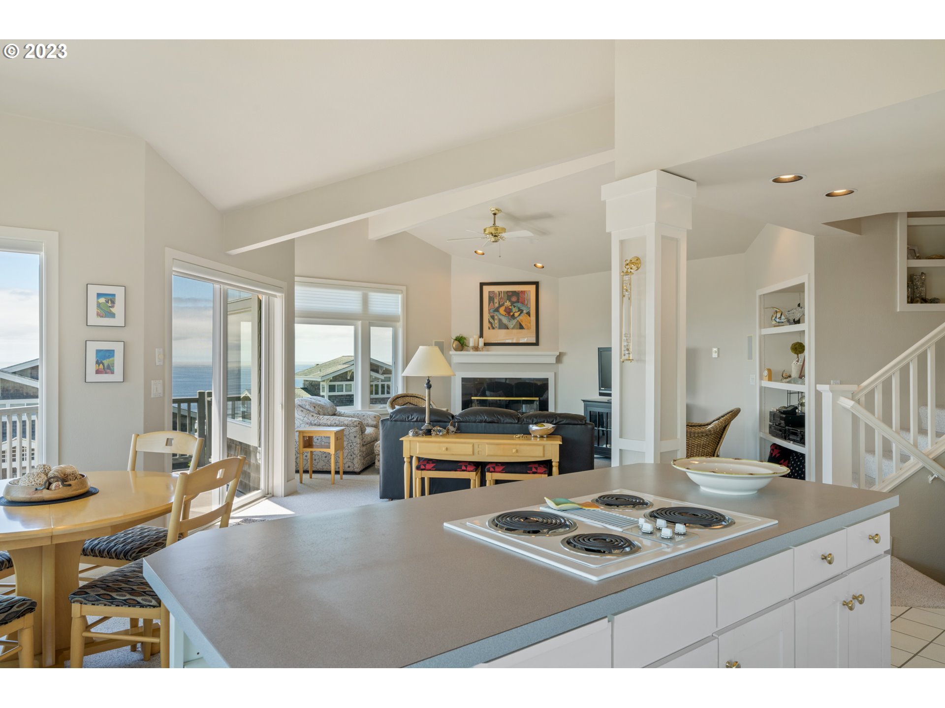 535 Capes Point Oceanside, OR 97141 - Photo 14 of 48 a living room with furniture and next to a window