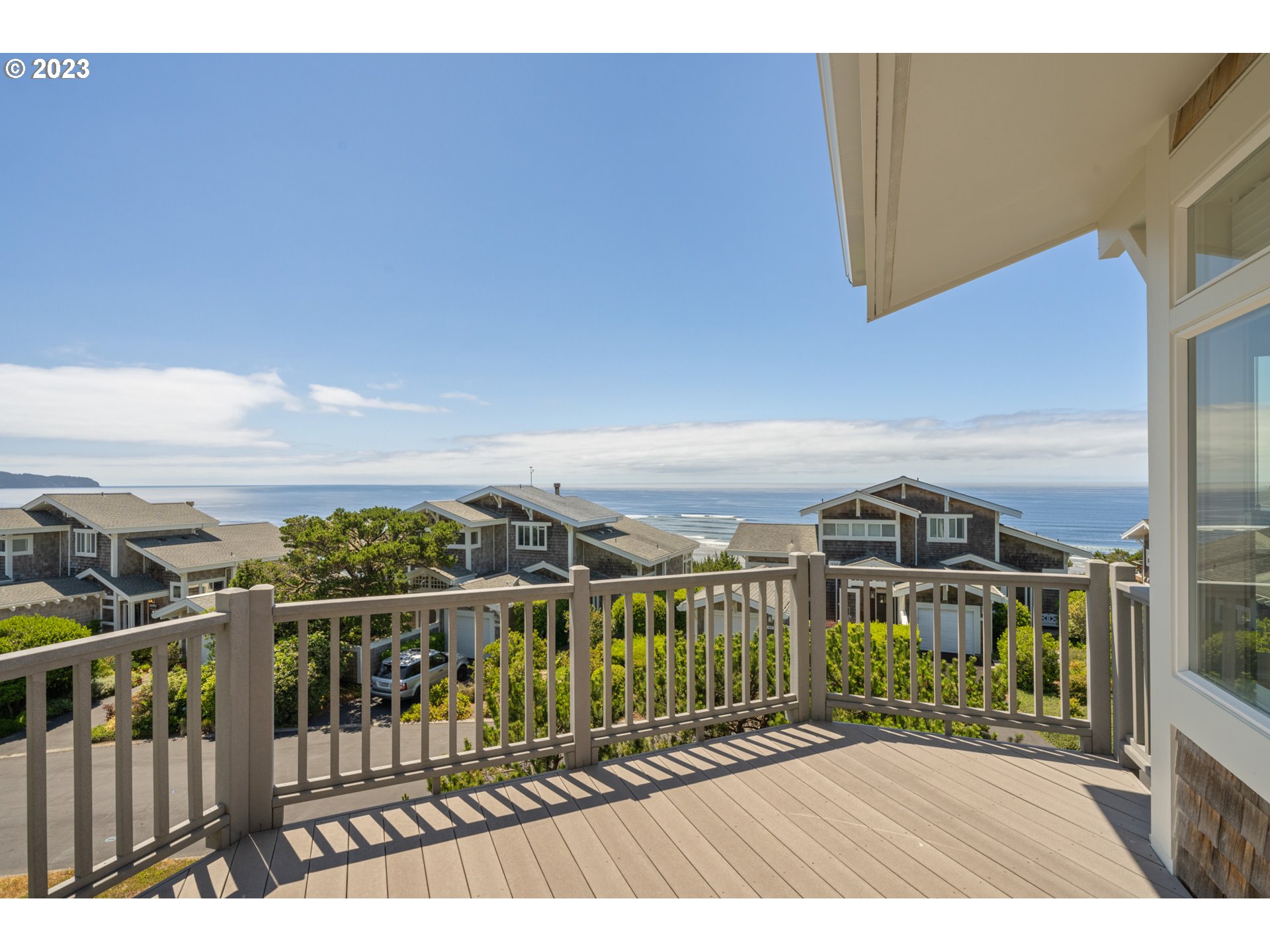 535 Capes Point Oceanside, OR 97141 - Photo 2 of 48 a view of a balcony with an ocean view