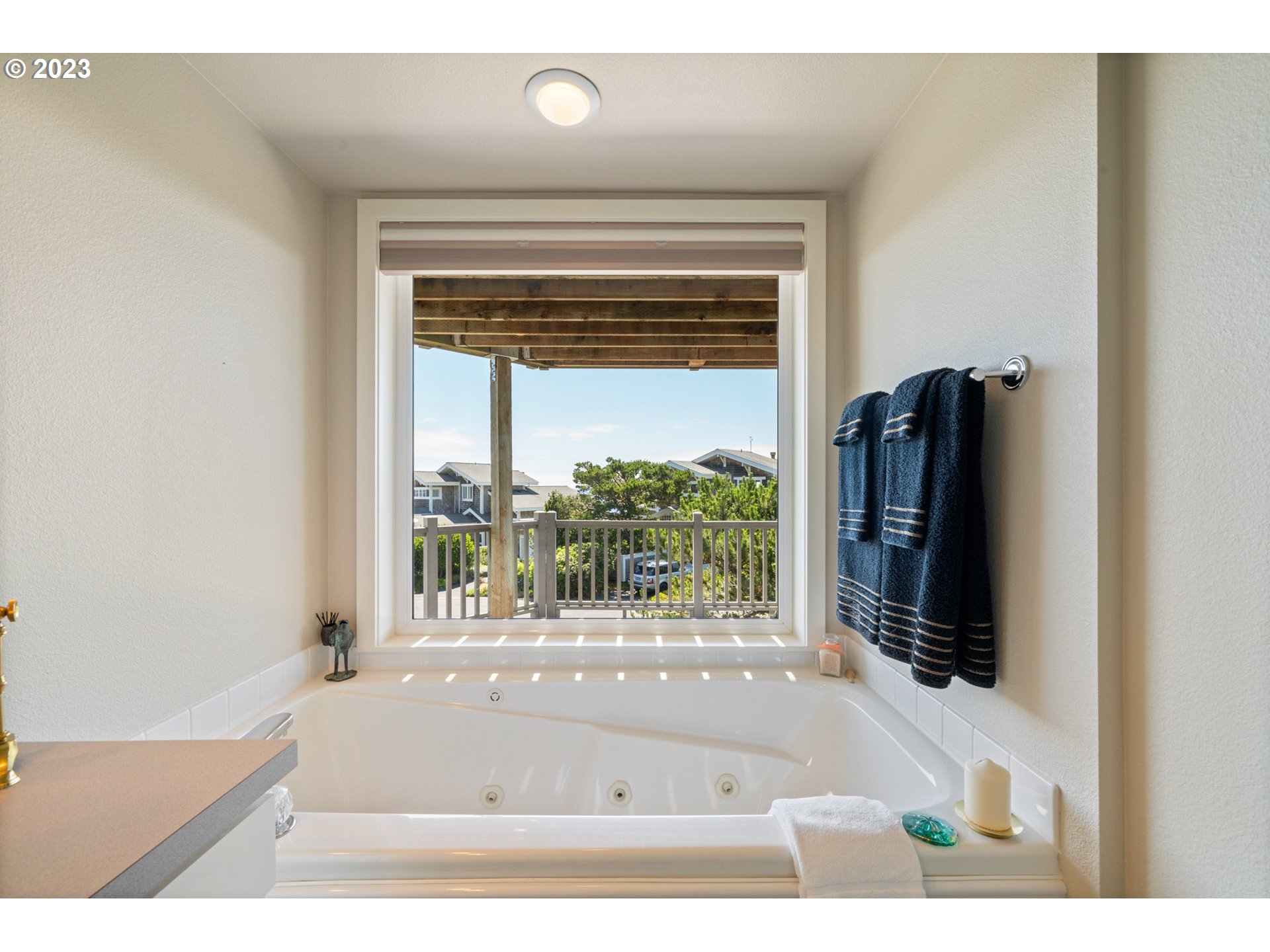 535 Capes Point Oceanside, OR 97141 - Photo 22 of 48 a bathroom with a bathtub and a shower