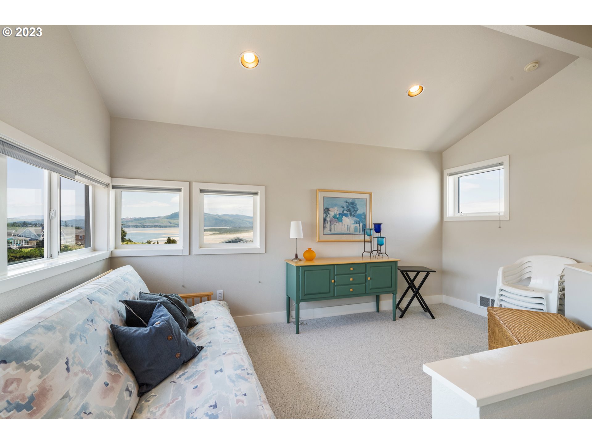 535 Capes Point Oceanside, OR 97141 - Photo 27 of 48 a living room with furniture and a window
