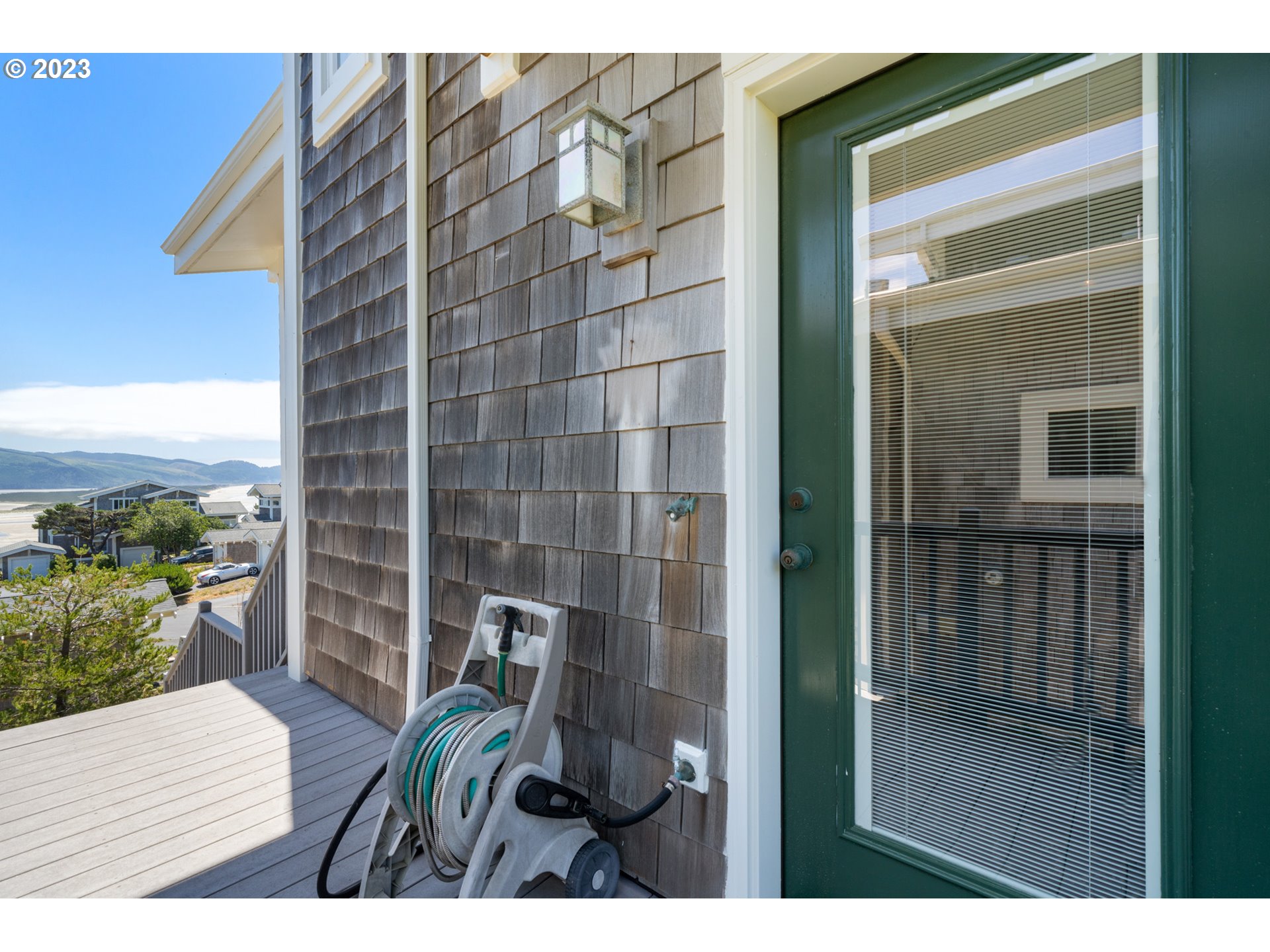 535 Capes Point Oceanside, OR 97141 - Photo 35 of 48 a view of balcony with wooden floor