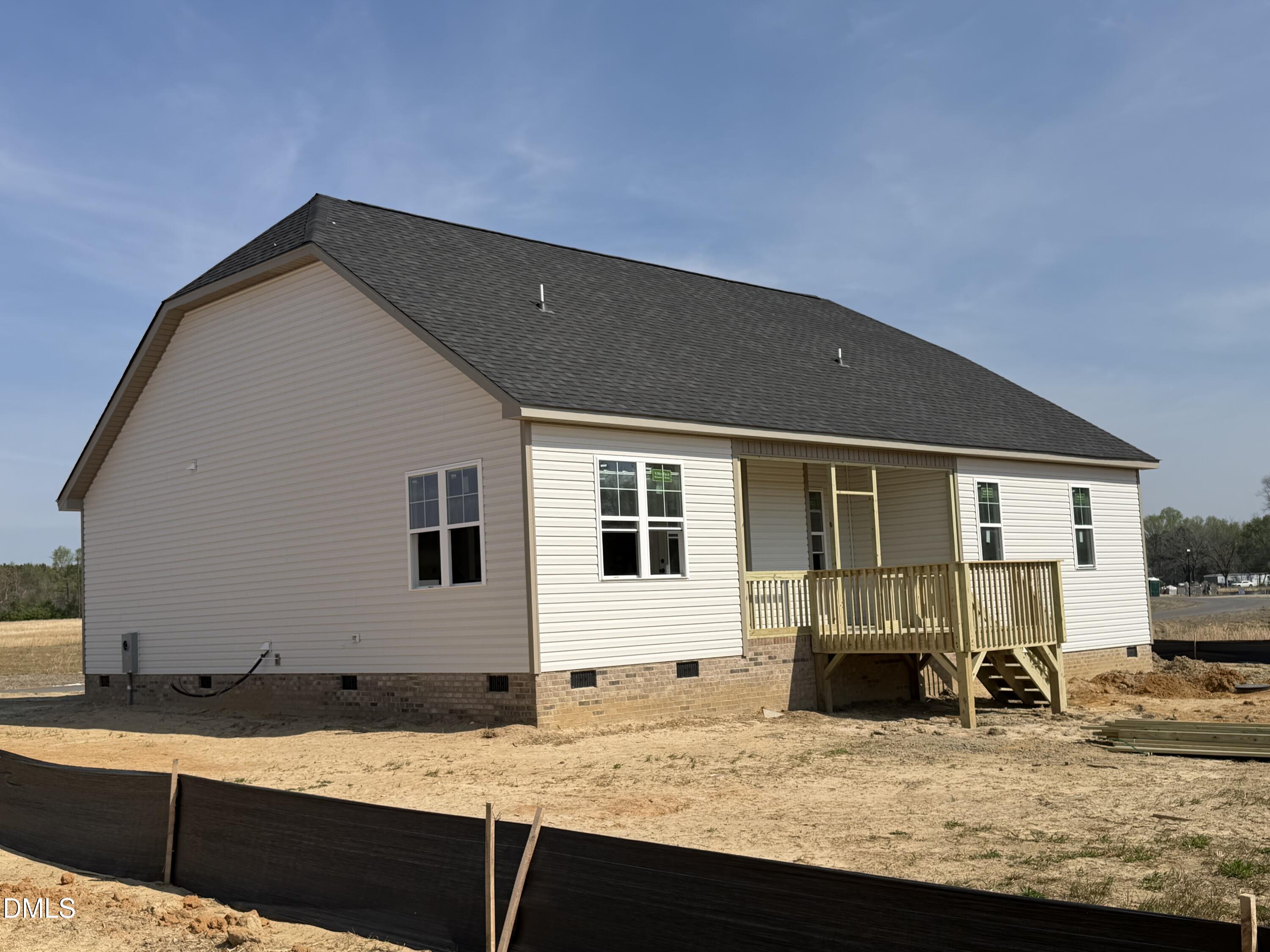 38 Charles Point Selma, NC 27576 - Photo 3 of 5 a view of house with backyard