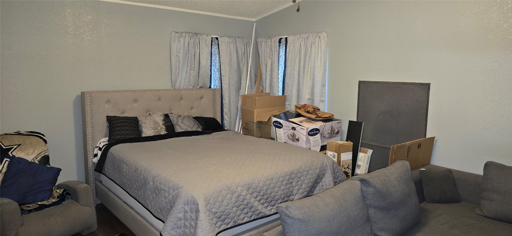 2002 Citation Drive Del Valle, TX 78617 - Photo 11 of 25 a bed room with a bed and a chair