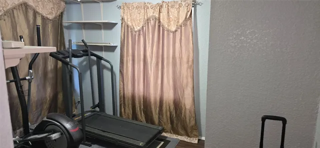 a view of a room with gym equipment