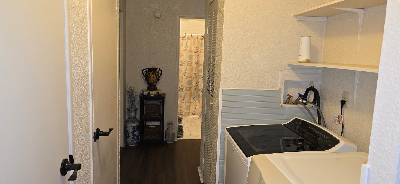 2002 Citation Drive Del Valle, TX 78617 - Photo 18 of 25 a close view of a sink and entryway in a bathroom