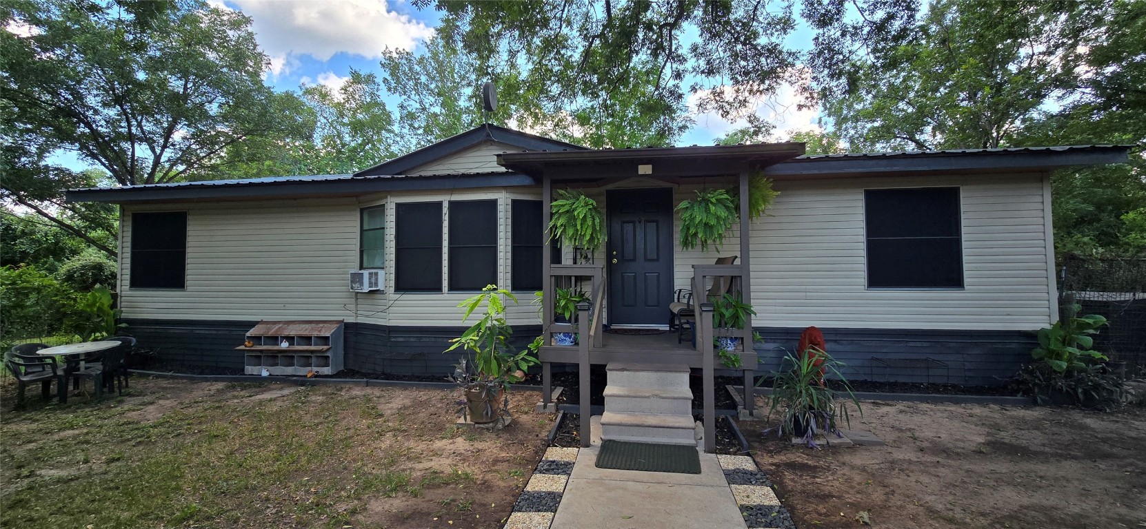2002 Citation Drive Del Valle, TX 78617 - Photo 2 of 25 a front view of a house with garden