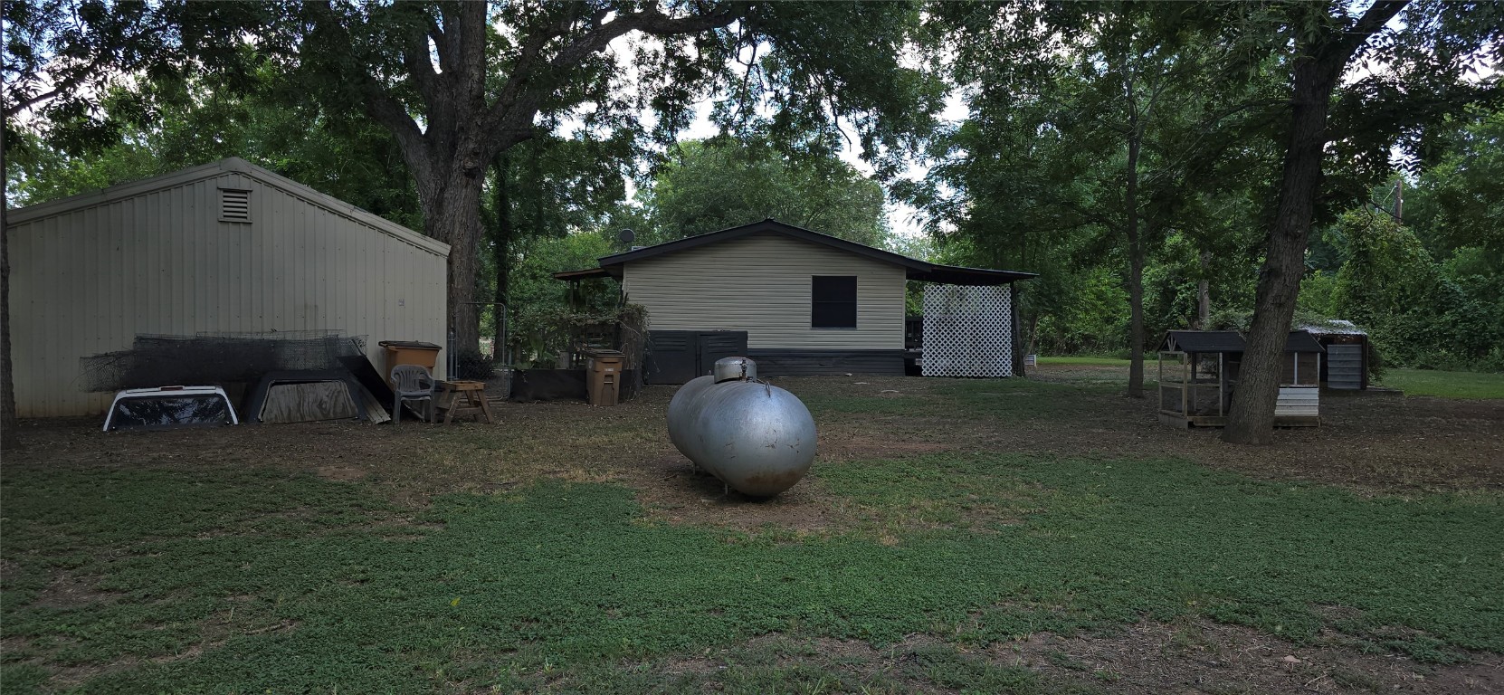 2002 Citation Drive Del Valle, TX 78617 - Photo 24 of 25 a backyard of a house with table and chairs
