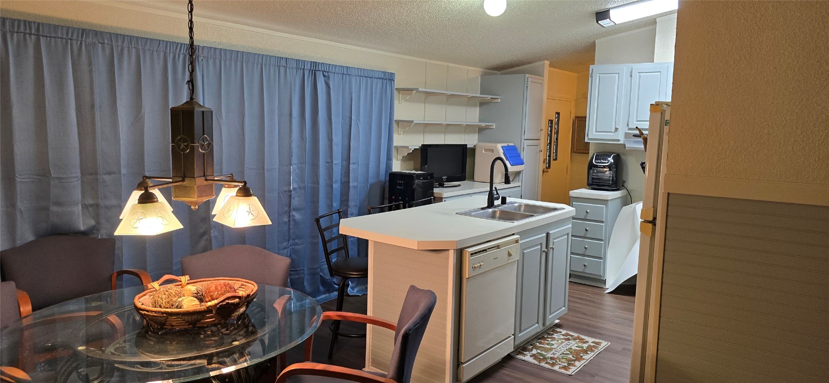 2002 Citation Drive Del Valle, TX 78617 - Photo 5 of 25 a kitchen with a sink appliances and cabinets