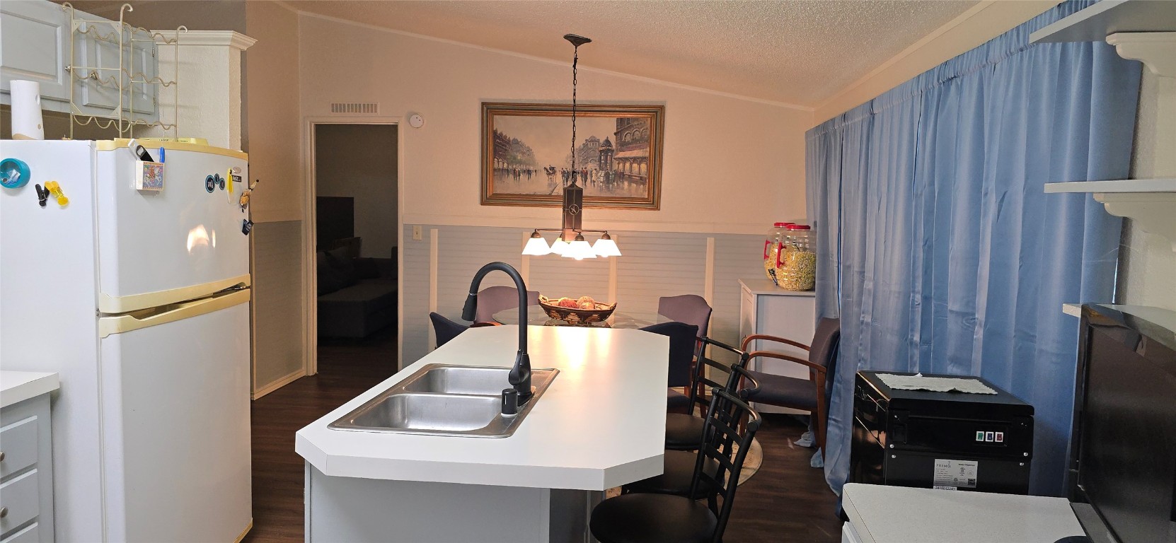 2002 Citation Drive Del Valle, TX 78617 - Photo 7 of 25 a view of a dining room with furniture window and wooden floor