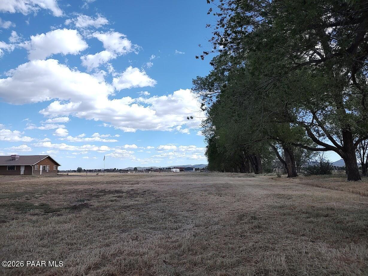 3980 West Rocky Road Paulden, AZ 86334 - Photo 15 of 32 a view of dirt field with trees