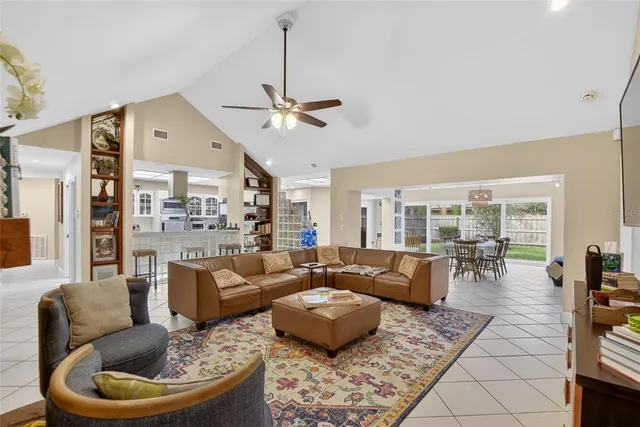 a bedroom with a bed and a chair