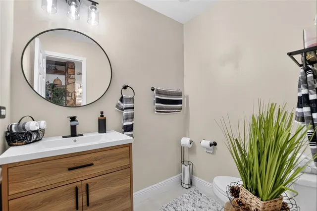 a front view of a house with a big yard