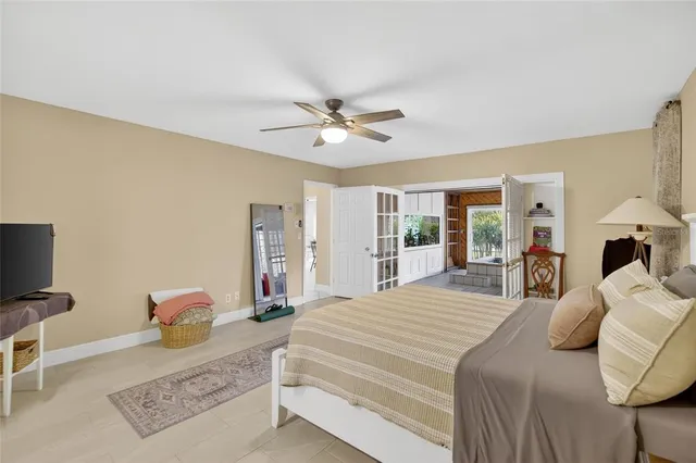 an aerial view of a house with a yard and garden