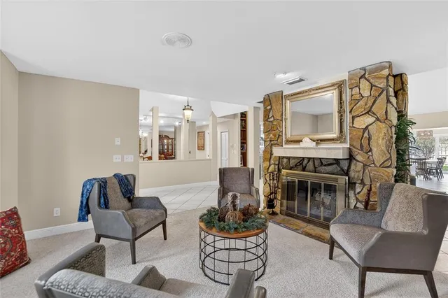 a kitchen with stainless steel appliances kitchen island granite countertop a sink and cabinets