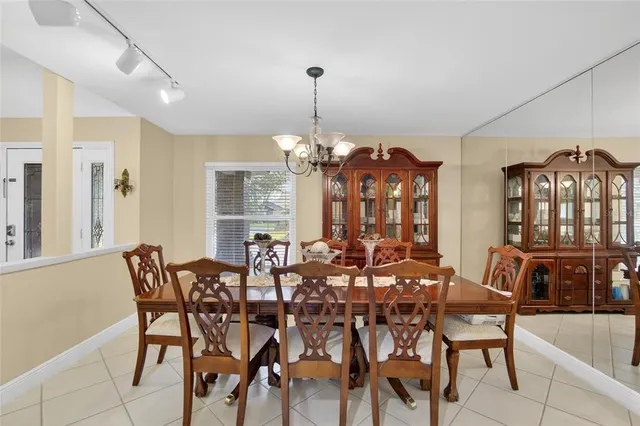 a kitchen with stainless steel appliances granite countertop a stove and cabinets