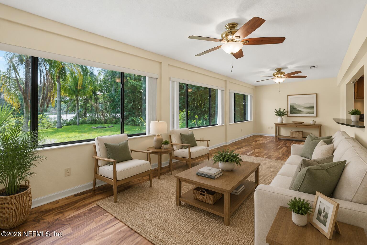 145 Finnigan Road Satsuma, FL 32189 - Photo 6 of 43 a living room with furniture and a large window