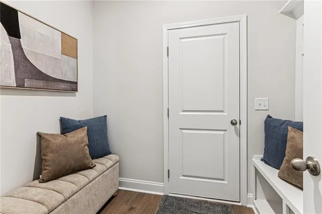 a living room with furniture and a gate