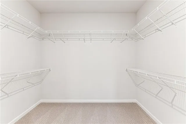a spacious bathroom with a double vanity sink mirror and double