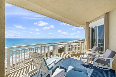 a view of a balcony with couch